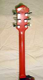 DeArmond M65C LP-style Salmon headstock rear.jpg